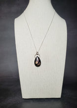 Load image into Gallery viewer, &quot;Don&#39;t let the bastards grind you down&quot; with rose-cut deep purple labradorite
