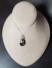 Load image into Gallery viewer, &quot;Don&#39;t let the bastards grind you down&quot; with rose-cut deep purple labradorite
