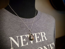 Load image into Gallery viewer, &quot;Don&#39;t let the bastards grind you down&quot; with rose-cut deep purple labradorite
