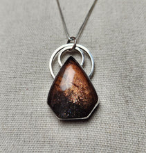 Load image into Gallery viewer, "Don't let the bastards grind you down" with purple haze sunstone
