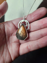 Load image into Gallery viewer, "Don't let the bastards grind you down" with purple haze sunstone
