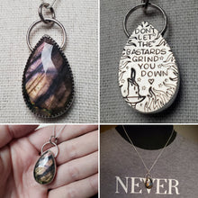 Load image into Gallery viewer, &quot;Don&#39;t let the bastards grind you down&quot; with rose-cut deep purple labradorite
